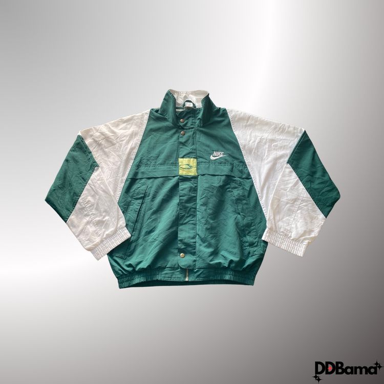 Vintage Nike windbreaker jacket in green and white.